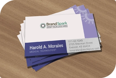 Some traditional business cards on a desk