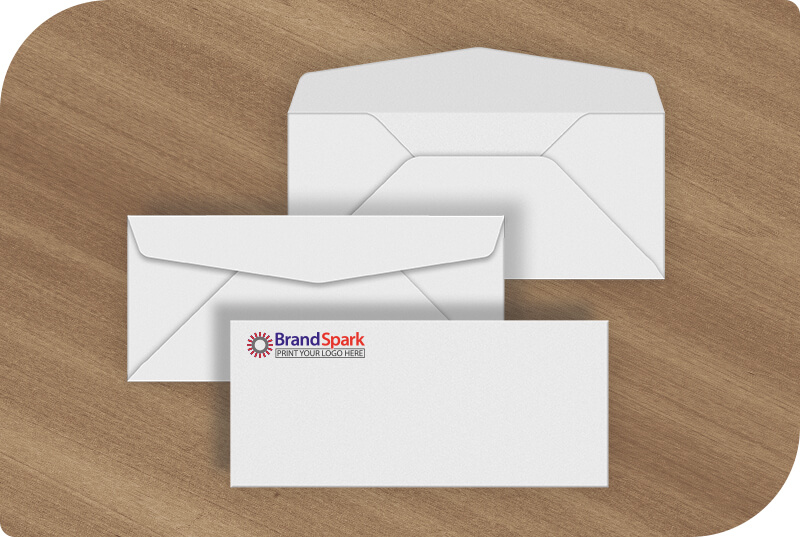 Some Commercial Envelopes on a desk showing different sides and logo printing